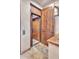 Private residential elevator with rich wood finishes adds convenience and accessibility to this home at 25572 N 113Th Way, Scottsdale, AZ 85255