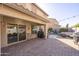 Spacious covered patio with brick pavers is perfect for outdoor dining and entertaining at 2636 S De Soto Rd, Apache Junction, AZ 85119