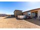 View of backyard with above ground pool providing a recreational space at 29318 N 224Th Dr, Wittmann, AZ 85361