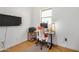 Bright office with a desk, office chair, and natural light from a window at 300 N Gila Springs Blvd # 160, Chandler, AZ 85226