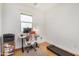 Office space with desk, office chair, treadmill, and natural light from the window at 300 N Gila Springs Blvd # 160, Chandler, AZ 85226