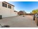 Backyard with a large patio area, built in barbeque, and basketball hoop at 31301 N Sunflower Way, San Tan Valley, AZ 85143