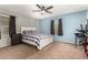Comfortable bedroom with modern decor and a large window letting in plenty of natural light at 31301 N Sunflower Way, San Tan Valley, AZ 85143