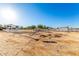 Large equestrian area surrounded by white fencing, providing plenty of room and space at 31301 N Sunflower Way, San Tan Valley, AZ 85143