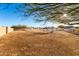 Extensive equestrian area featuring white fencing, open space, and well-maintained grounds at 31301 N Sunflower Way, San Tan Valley, AZ 85143