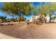 Charming two-story home with desert landscaping and a three-car garage at 31301 N Sunflower Way, San Tan Valley, AZ 85143