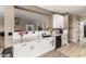 Beautiful kitchen sink with granite countertops, white cabinets, and stylish fixtures at 31301 N Sunflower Way, San Tan Valley, AZ 85143