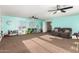 Large open living area with ample sunlight, perfect for Gathering gatherings and activities at 31301 N Sunflower Way, San Tan Valley, AZ 85143