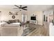 Inviting living room with comfortable seating, a ceiling fan, and natural light, perfect for relaxation at 31301 N Sunflower Way, San Tan Valley, AZ 85143