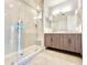 Modern bathroom featuring a glass-enclosed shower, double sinks, and stylish vanity at 3233 N 70Th St # 1006, Scottsdale, AZ 85251
