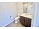 Clean bathroom with a wood vanity, modern sink, and plenty of light at 3233 N 70Th St # 1006, Scottsdale, AZ 85251