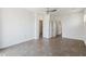 Spacious bedroom featuring tile flooring, neutral walls, recessed lighting, and multiple doorways at 3233 N 70Th St # 1006, Scottsdale, AZ 85251