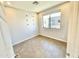 Bright bedroom with a large window providing ample natural light and neutral flooring at 3233 N 70Th St # 1006, Scottsdale, AZ 85251