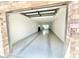 Spacious two car garage features epoxy flooring, high ceilings, and access to the backyard at 3233 N 70Th St # 1006, Scottsdale, AZ 85251