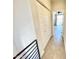Hallway with closet and a doorway to a room with a fan at 3233 N 70Th St # 1006, Scottsdale, AZ 85251