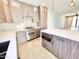 This kitchen offers quartz counters, stainless appliances, and a stainless range at 3233 N 70Th St # 1006, Scottsdale, AZ 85251