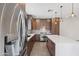 View of the kitchen with stainless steel appliances and light-filled cabinets at 3233 N 70Th St # 1006, Scottsdale, AZ 85251