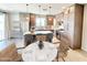 Eat-in kitchen featuring stainless steel appliances, light countertops, and designer cabinets at 3233 N 70Th St # 1006, Scottsdale, AZ 85251