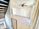 Spacious living room with high ceilings, staircase with metal railing, and neutral tile flooring at 3233 N 70Th St # 1006, Scottsdale, AZ 85251