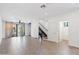 Bright, open-concept living area featuring tile floors and a modern stairway at 3233 N 70Th St # 1006, Scottsdale, AZ 85251