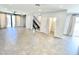 Spacious living room featuring tile floors, ceiling fan, and access to the patio at 3233 N 70Th St # 1006, Scottsdale, AZ 85251