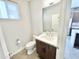 Stylish powder room featuring a modern vanity with sleek fixtures and neutral wall colors at 3233 N 70Th St # 1006, Scottsdale, AZ 85251