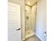 Walk-in shower with glass door and bench in this bathroom at 3233 N 70Th St # 1006, Scottsdale, AZ 85251