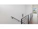 Hallway with metal railing and stairway at 3233 N 70Th St # 1006, Scottsdale, AZ 85251