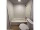 Bright bathroom featuring a tiled shower/tub and a modern toilet at 349 E Thomas Rd # E301, Phoenix, AZ 85012