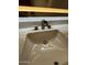 Bathroom sink featuring modern faucet and illuminated mirror at 349 E Thomas Rd # E301, Phoenix, AZ 85012