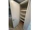 A deep linen closet is equipped with custom shelving at 349 E Thomas Rd # E301, Phoenix, AZ 85012