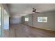 Spacious and bright living room featuring wood floors and natural lighting at 349 E Thomas Rd # E301, Phoenix, AZ 85012