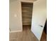 Pantry with multiple shelves and light wood floor at 349 E Thomas Rd # E301, Phoenix, AZ 85012
