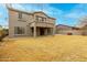 Two-story home featuring an open backyard with covered patio and landscaping at 3663 S Soho Ln, Chandler, AZ 85286