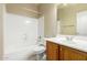 Bathroom with a tiled floor, toilet, vanity, and shower-tub combo at 3663 S Soho Ln, Chandler, AZ 85286