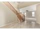 Bright foyer with soaring ceilings, staircase, and views of the open-concept living area at 3663 S Soho Ln, Chandler, AZ 85286