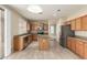 Traditional kitchen features tile flooring, stainless steel appliances, and central island at 3663 S Soho Ln, Chandler, AZ 85286
