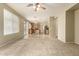 Open living space flows into kitchen with central island and stainless steel appliances at 3663 S Soho Ln, Chandler, AZ 85286
