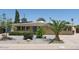 Charming single-story home with desert landscaping, a mature palm tree, and a freshly painted facade at 3802 E Shaw Butte Dr, Phoenix, AZ 85028