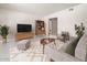 Serene living room featuring a modern design, ample space, and abundant natural light at 3802 E Shaw Butte Dr, Phoenix, AZ 85028