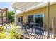 Covered patio features an outdoor dining area with seating for six, providing a perfect space for entertaining guests at 3802 E Shaw Butte Dr, Phoenix, AZ 85028