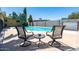 Outdoor seating area overlooking a refreshing swimming pool in a private backyard, creating a relaxing ambiance at 3802 E Shaw Butte Dr, Phoenix, AZ 85028
