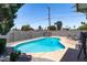 Private swimming pool nestled in a fenced backyard, offering a serene space for recreation and enjoyment at 3802 E Shaw Butte Dr, Phoenix, AZ 85028
