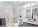Bright bathroom with shower-tub combo, marble countertop, and a large mirror at 461 W Holmes -- # 342, Mesa, AZ 85210