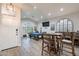 Well-lit game room with a pool table, a bar area, and views of the backyard at 4637 E Fernwood Ct, Cave Creek, AZ 85331