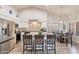 Spacious kitchen area featuring stainless steel appliances, island seating, and a dining area at 4637 E Fernwood Ct, Cave Creek, AZ 85331