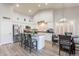 Bright kitchen featuring stainless steel appliances, an island with seating, and stylish countertops at 4637 E Fernwood Ct, Cave Creek, AZ 85331