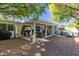 Relaxing backyard with covered patio, gravel, and access to the hot tub for outdoor enjoyment at 4709 N 77Th Pl, Scottsdale, AZ 85251