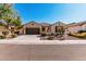 Charming single-story home featuring a well-manicured front yard and a two-car garage at 4791 S White Pl, Chandler, AZ 85249