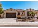 Charming single-story home with a well-manicured yard and a two-car garage at 4791 S White Pl, Chandler, AZ 85249